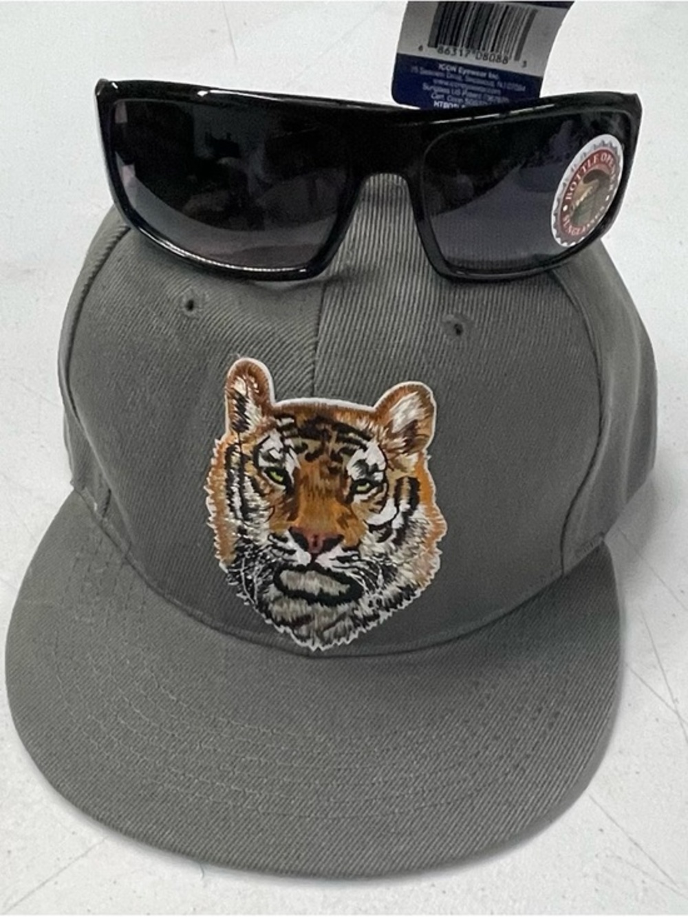 Detroit Tigers Grey Snapback Hat with Embroidered Tiger and cap off sunglasses